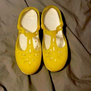 Yellow Crocs jelly shoes